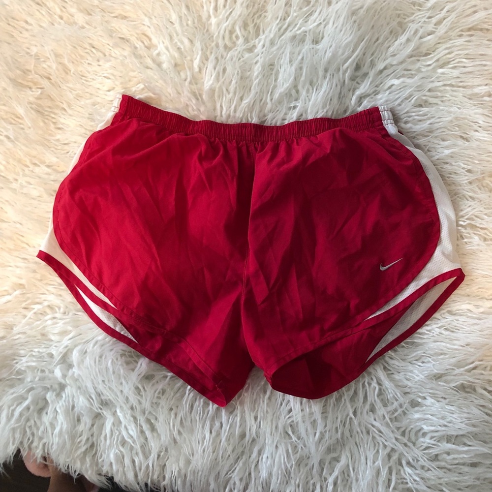Red Nike shorts, L